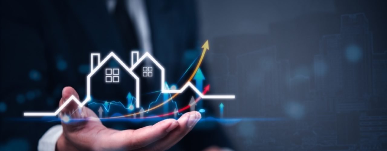 Businessman,Holding,Virtual,Graph,Showing,Real,Estate,Market,Growth.,Perfect